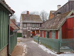 Narrow streets around traditional wooden houses in a museum